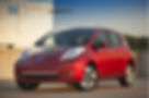 A red Nissan Leaf electric car