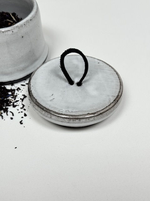 Thumbnail: Tapered Black and White Jar with Leather Handle