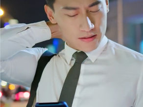 man looking at phone rubbing his neck Dianagordonlmt blog