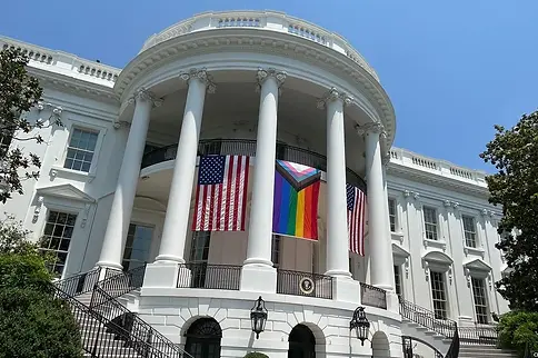 the-white-house-with-pride-and-u-s-flags.jpg.webp