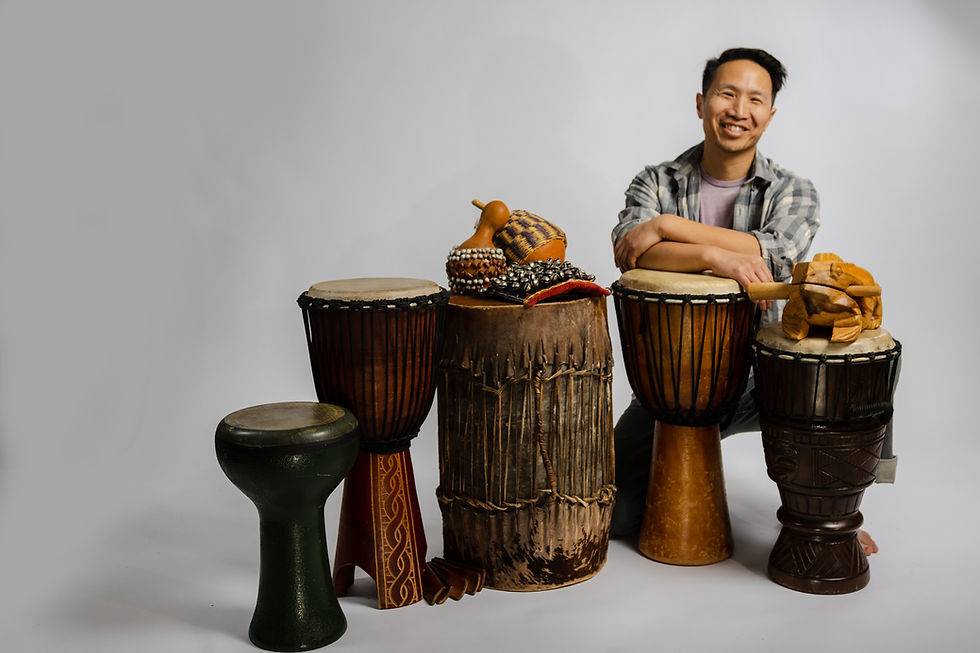 Interactive drum circle team building session in Edmonton — group drumming for corporate wellness