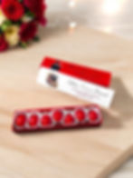 Scatolina tight personalizzata con 7 confetti assortiti colore a scelta, posizionati nei singoli pirottini.