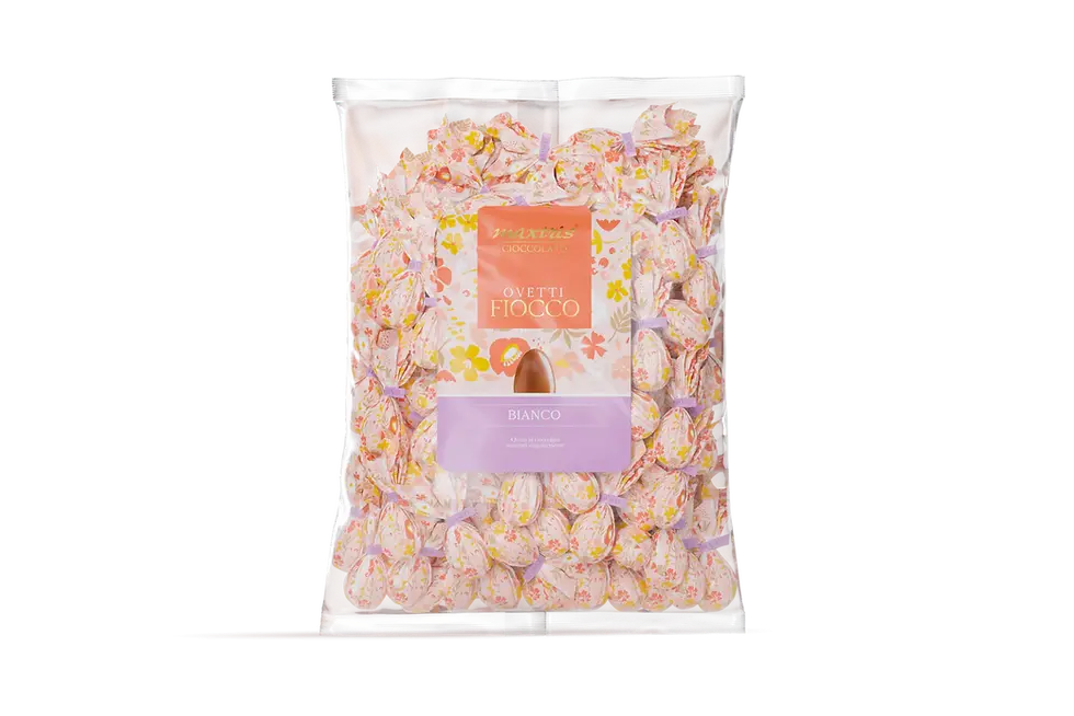 Bag Fiocco Gusto Cioccolato bianco. Ovetti con cioccolato al gusto cioccolato bianco, incartati singolarmente in monofiocco.