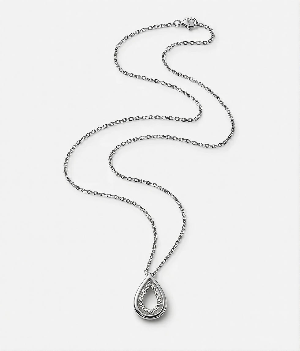 Zirkon taş detaylı içi boş damla figürlü 925 ayar gümüş kolye.