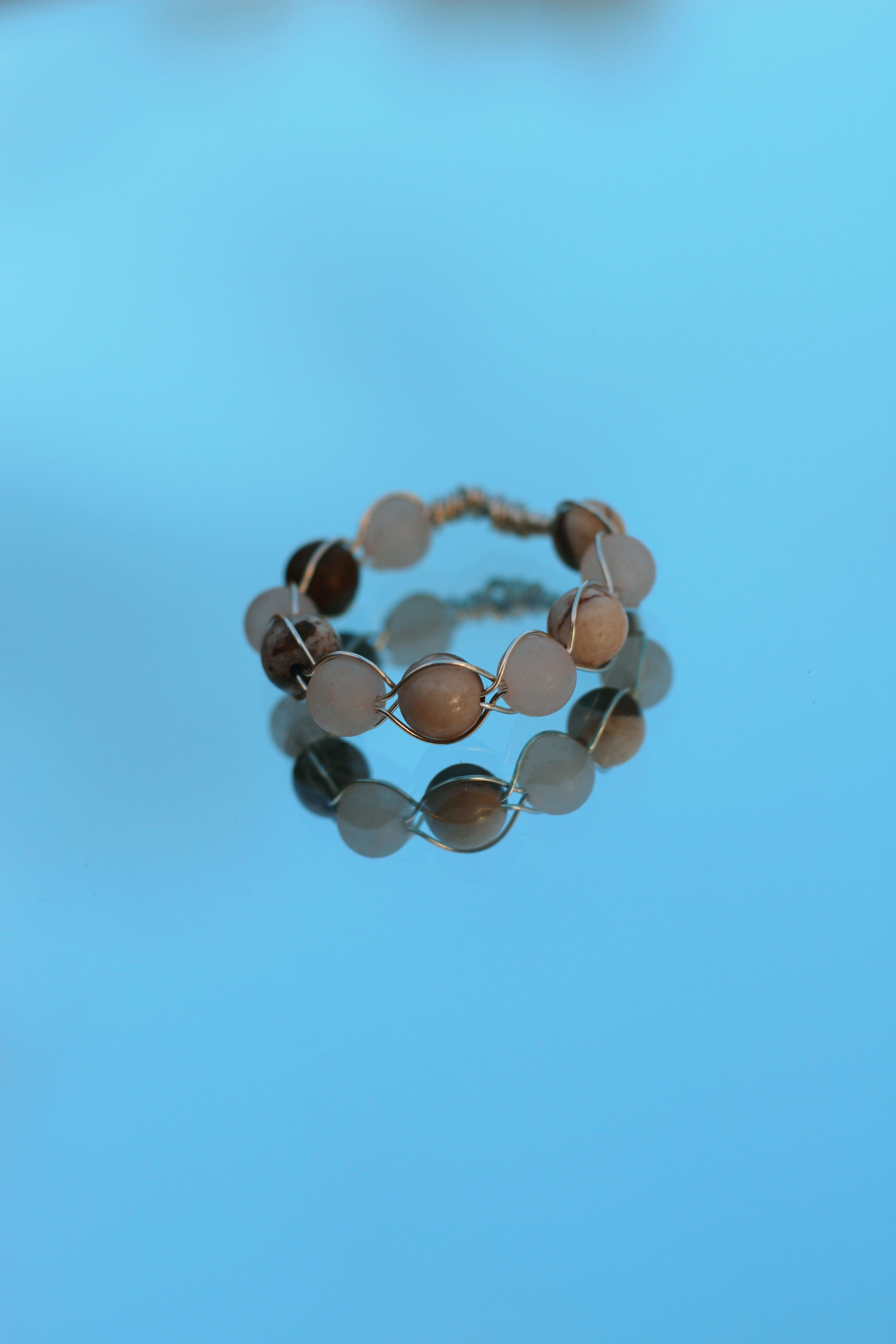 rose quartz and wood beaded ring