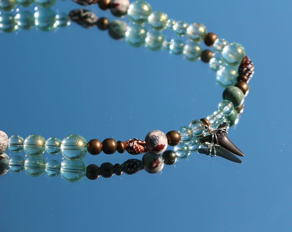 Thumbnail: green shark tooth necklace