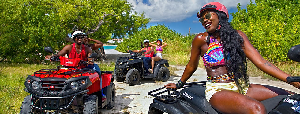 a group of friends riding ATVs in a appropriate setting.
