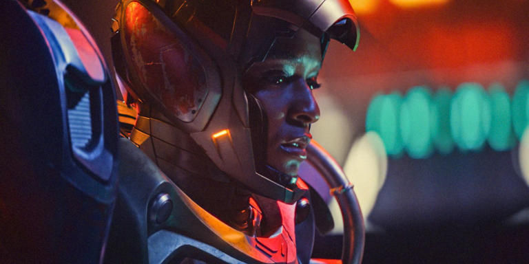 A photo of the character RIRI in her iron heart v1 suite. We don't care, she's cute. In or out of the robot suite.