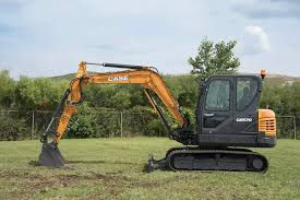 CX57C case excavator on grass.