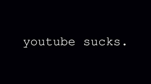 a black photo that reads: youtube sucks..