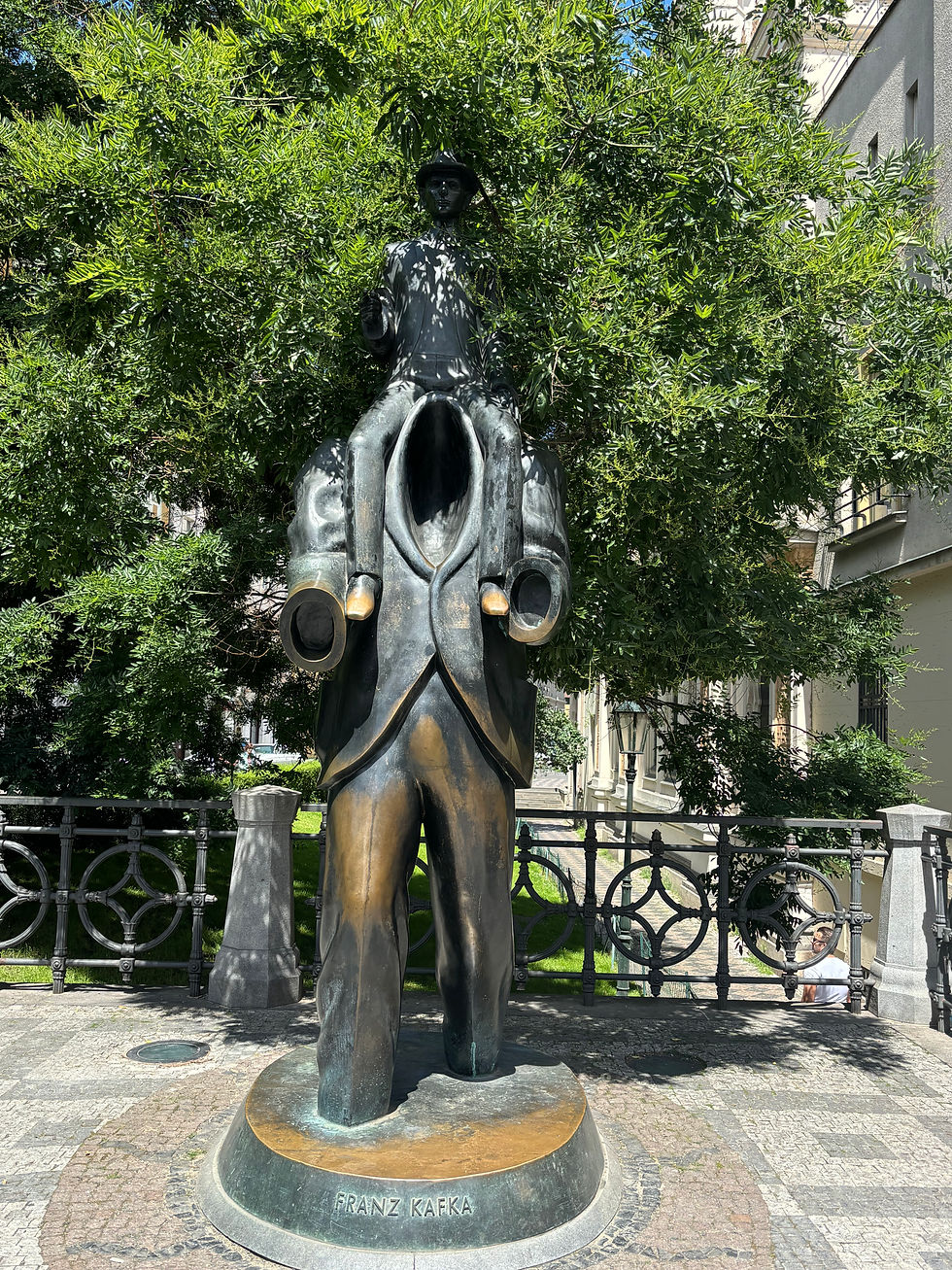 A bronze sculpture depicting Franz Kafka a Jewish literary artist.