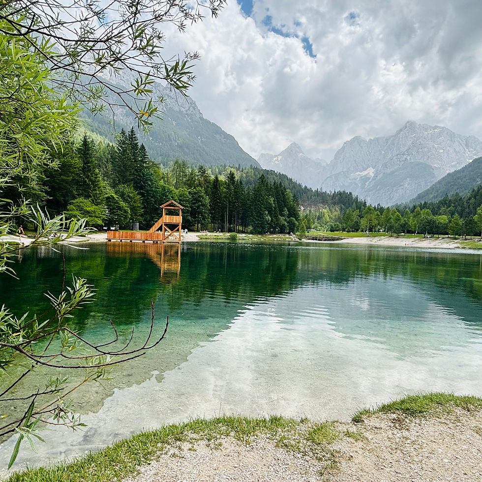 Lake Jasna showing the layers of mountains an beautiful green water