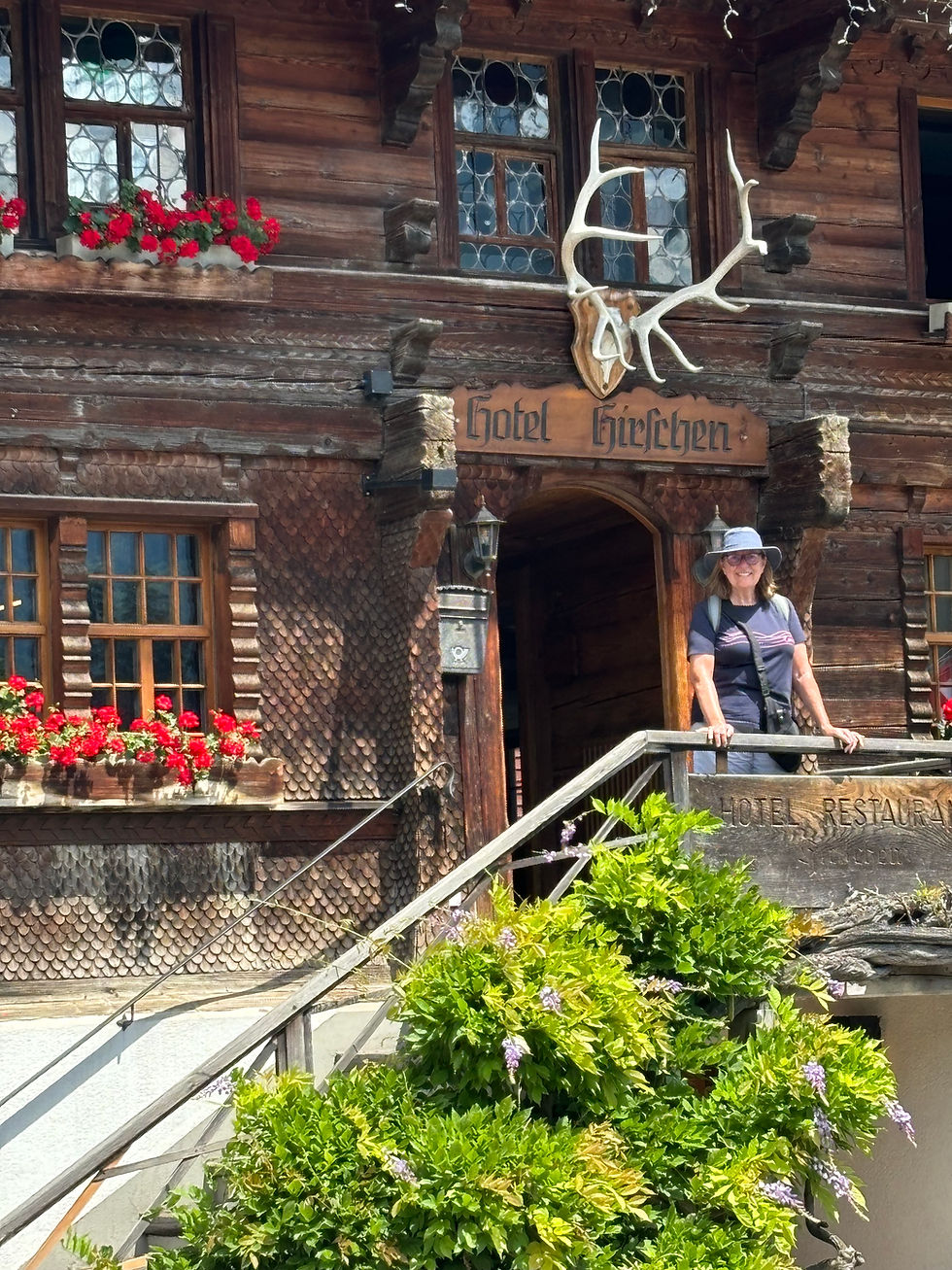 Karen standing on the steps of the Gastof Hirschen
