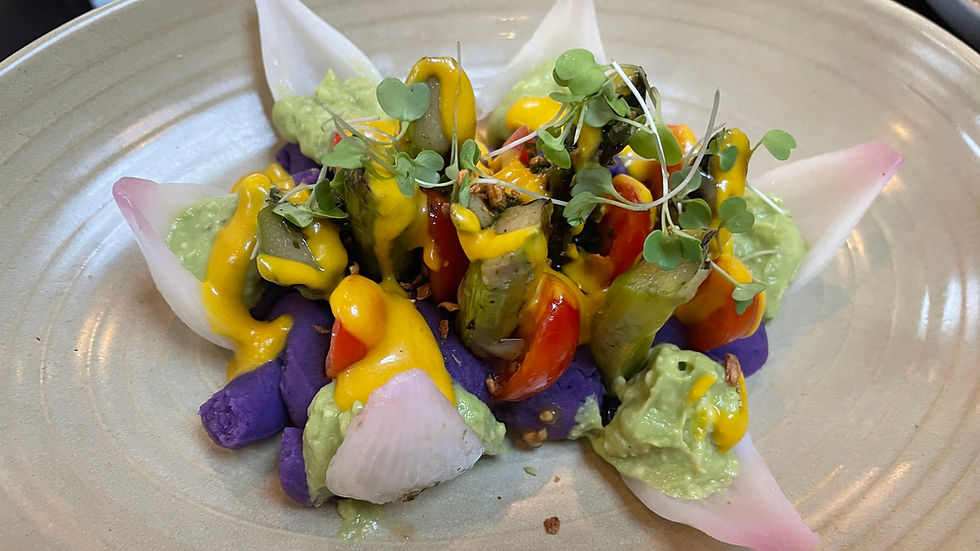 Salad with avocado microgreens and flowers
