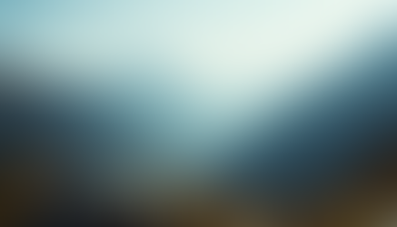 A mountain landscape showing the different colours of blue/grey