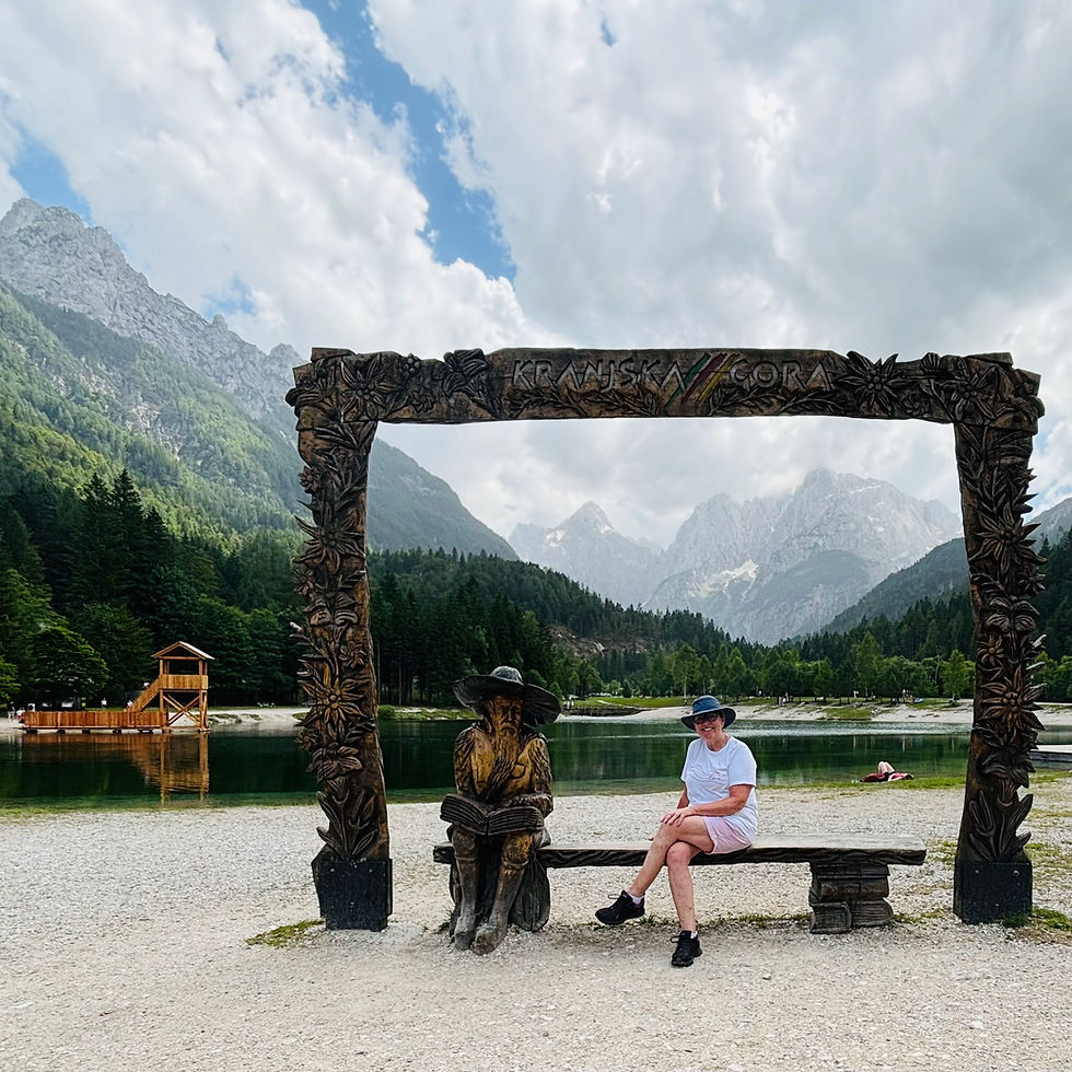 Sitting on a bench framing the background with a frame - artwork