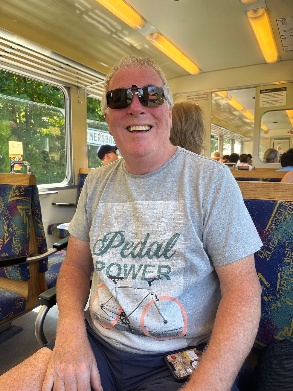 It was so hot Michael appreciated the natural air conditioning of the open windows on the train