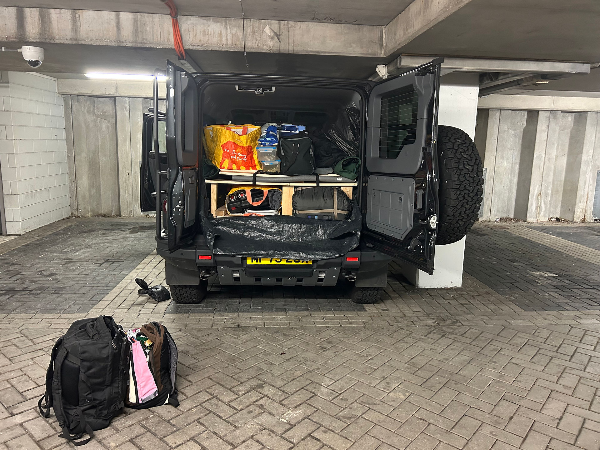 Taking just the luggage we need as we leave our car in the park and ride