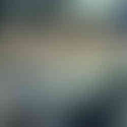 Sculptures of three men on an half sphere near the University of Auckland