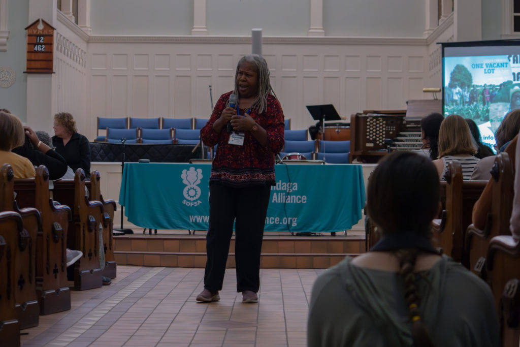 Karen Washington speaks to the crowd about how "food justice goes further than just growing food and feeding people." (Credit: So Nishitani)