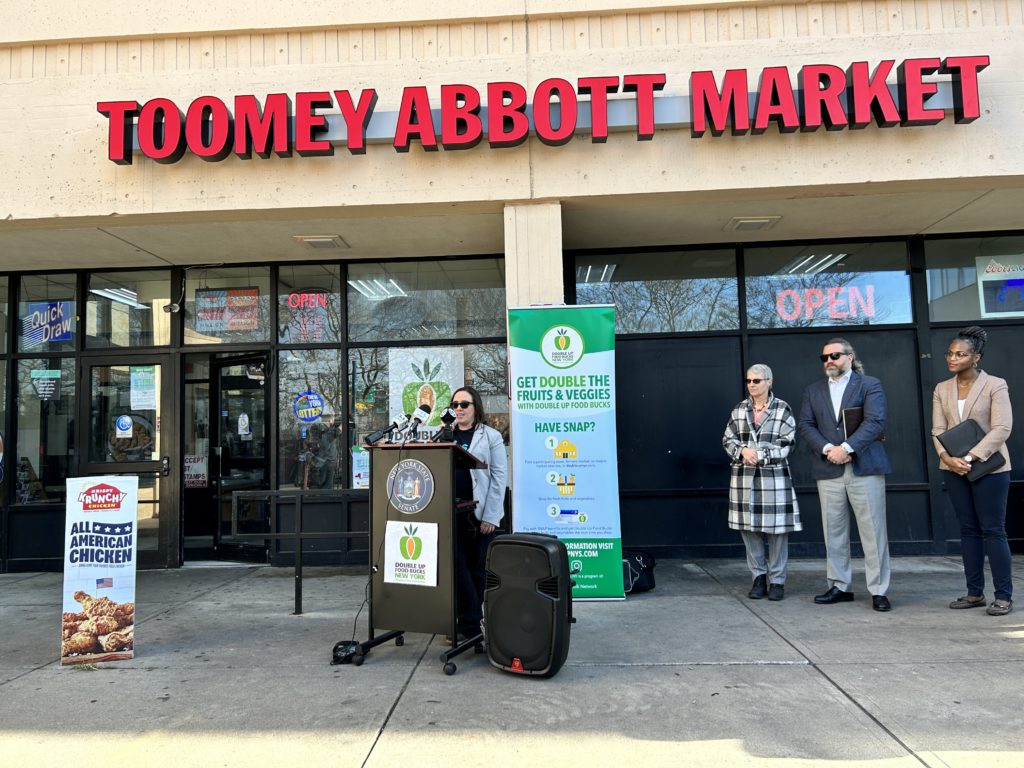 SOFSA Director Maura Ackerman speaks on the importance of this program at Toomey Abbott Market.