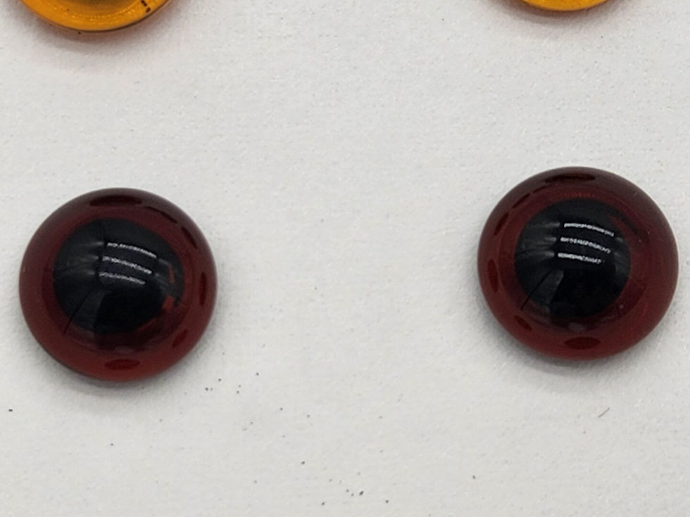 Thumbnail: Glass eyes on wire loops