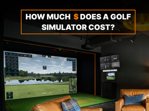 Custom indoor golf simulator installation featuring an overhead launch monitor, premium impact screen, turf flooring, and luxury lounge seating designed for immersive year-round golf practice and entertainment.