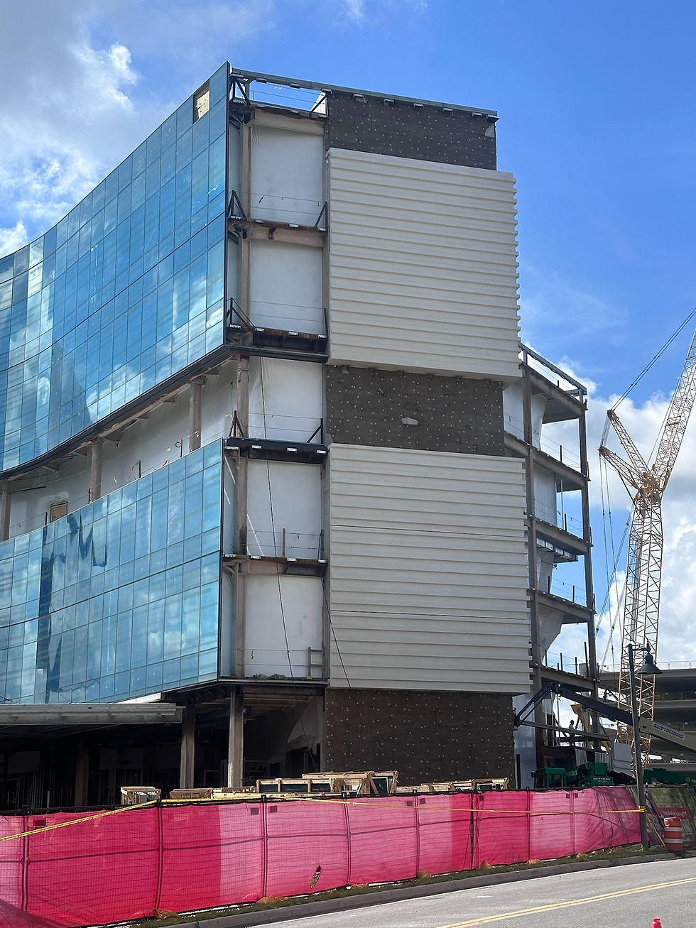 Global Wrap weather protection system providing building containment with 12 mil FR shrink wrap walls