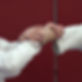 The hands of two women demonstrating a wrist lock in ju-jitsu class
