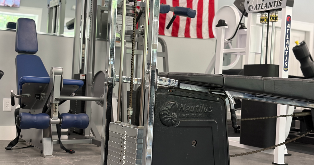 Bodymasters S 109 Super Leg Extension, Full Chrome Gen 1 Leg Curl, VR Cybex Standing Calf Raise, and Atlantis Glute kickback machine at Kaman's Gym in Lexington South Carolina