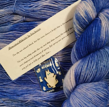 Blue hand dyed yarn in a Moomin inspired colourway