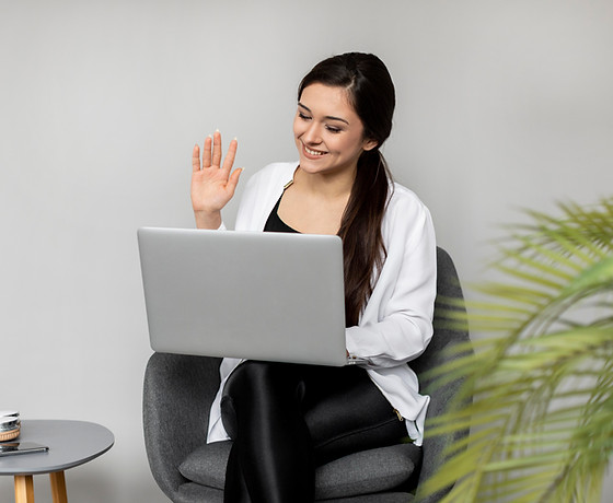 medium-shot-smiley-woman-waving.jpg