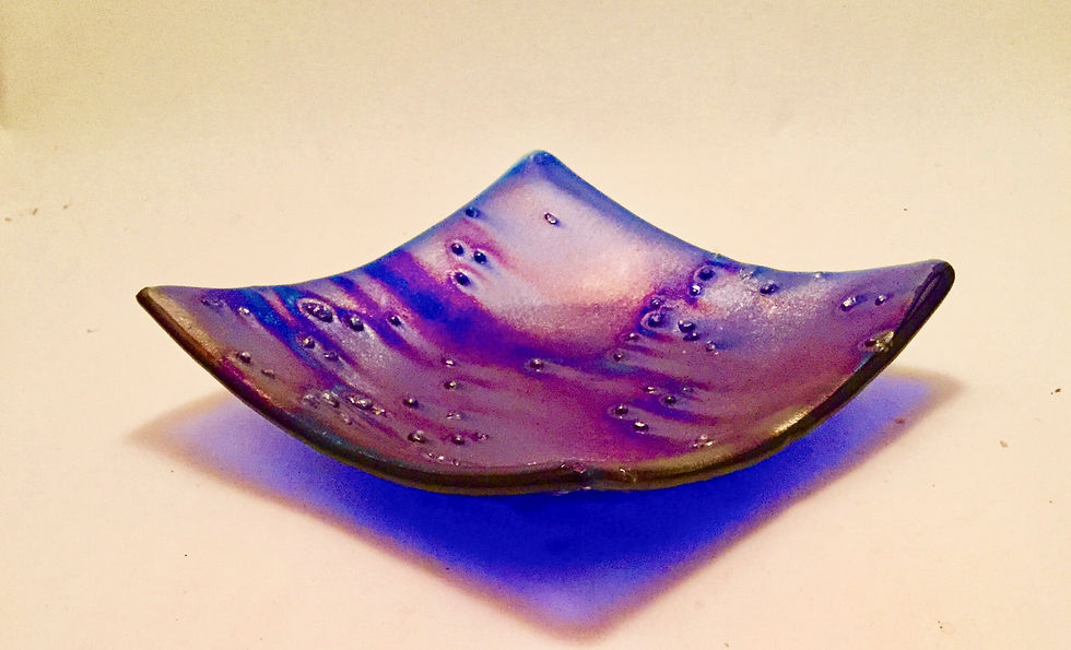 Iridescent blue glass bowl