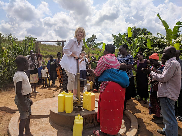 Fiona Jeffery OBE at handpump in Buguluube, Uganda v2.jpg