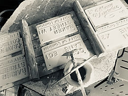 Freshly hand glazed, London Street Signs. Almost fready to be fired in the pottery kiln, reaching temperatures over 1000 centigrade.