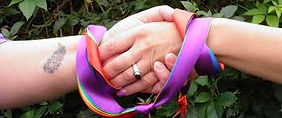 Hand Binding Rainbow ribbons.jpg