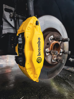 Custom painted yellow Brembo brake calipers