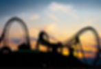 A rollercoaster at sunset.