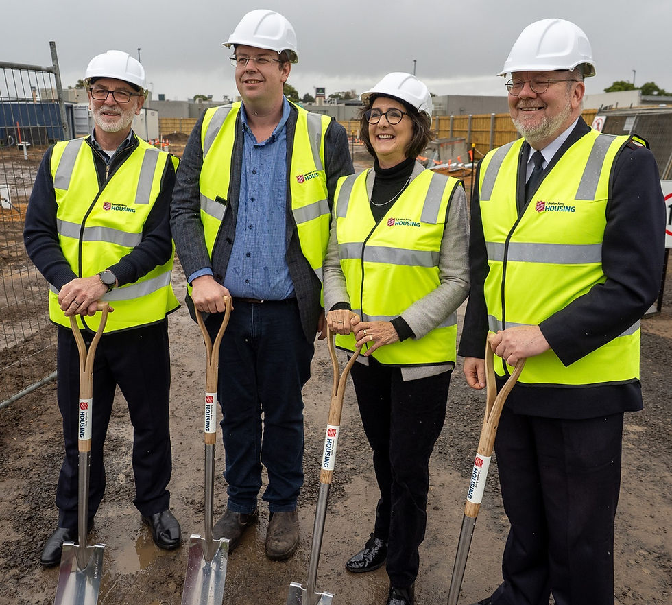 Major Brett Allchin (left), Cr Ben Blain, Ms Jacinta Ermacora and Major Mal Davies pictured at the construction site of the 21 new social housing properties.