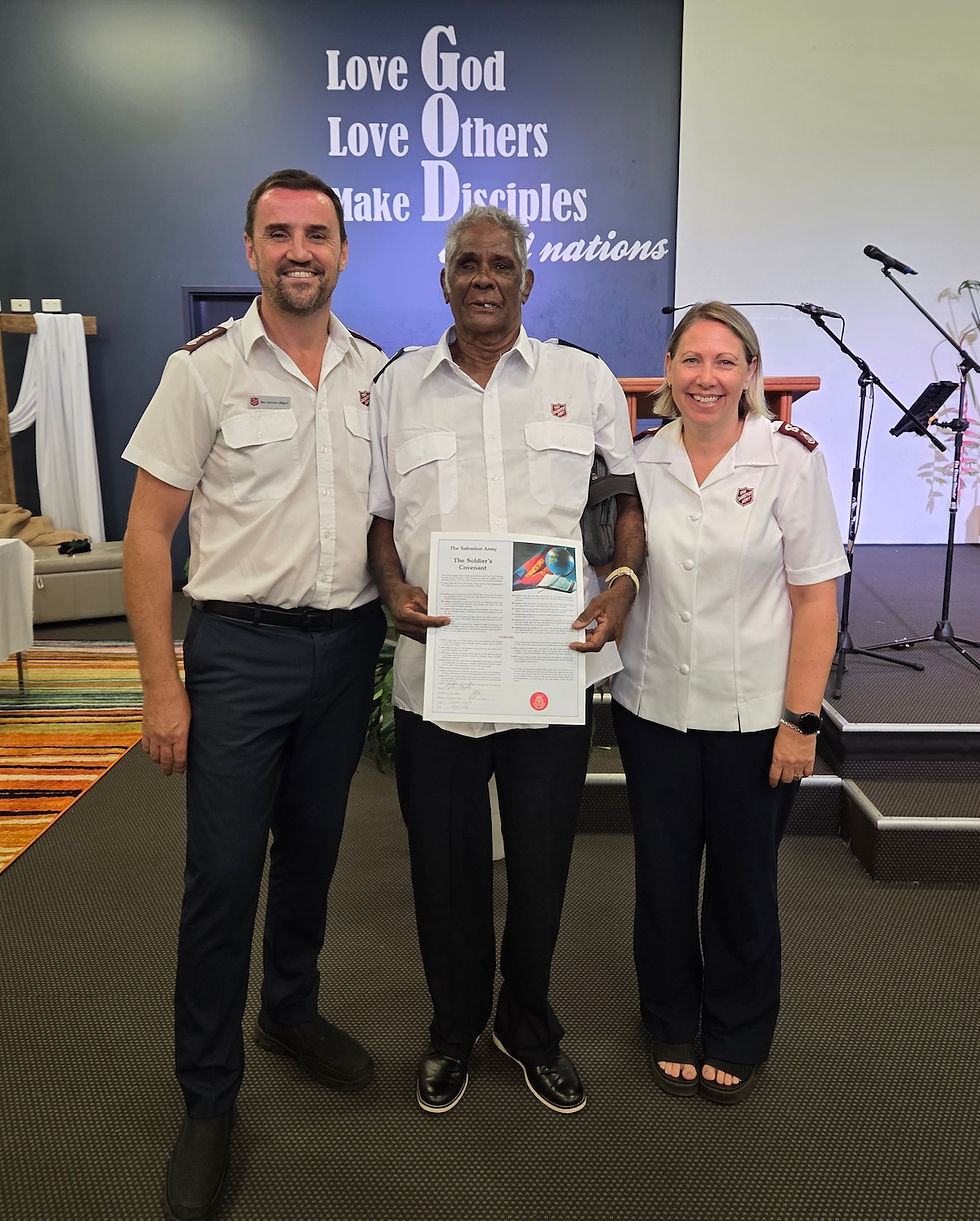 Newly enrolled senior soldier Uncle Peter Hyde with Cairns Corps Officers Majors Ben and Emma Johnson.