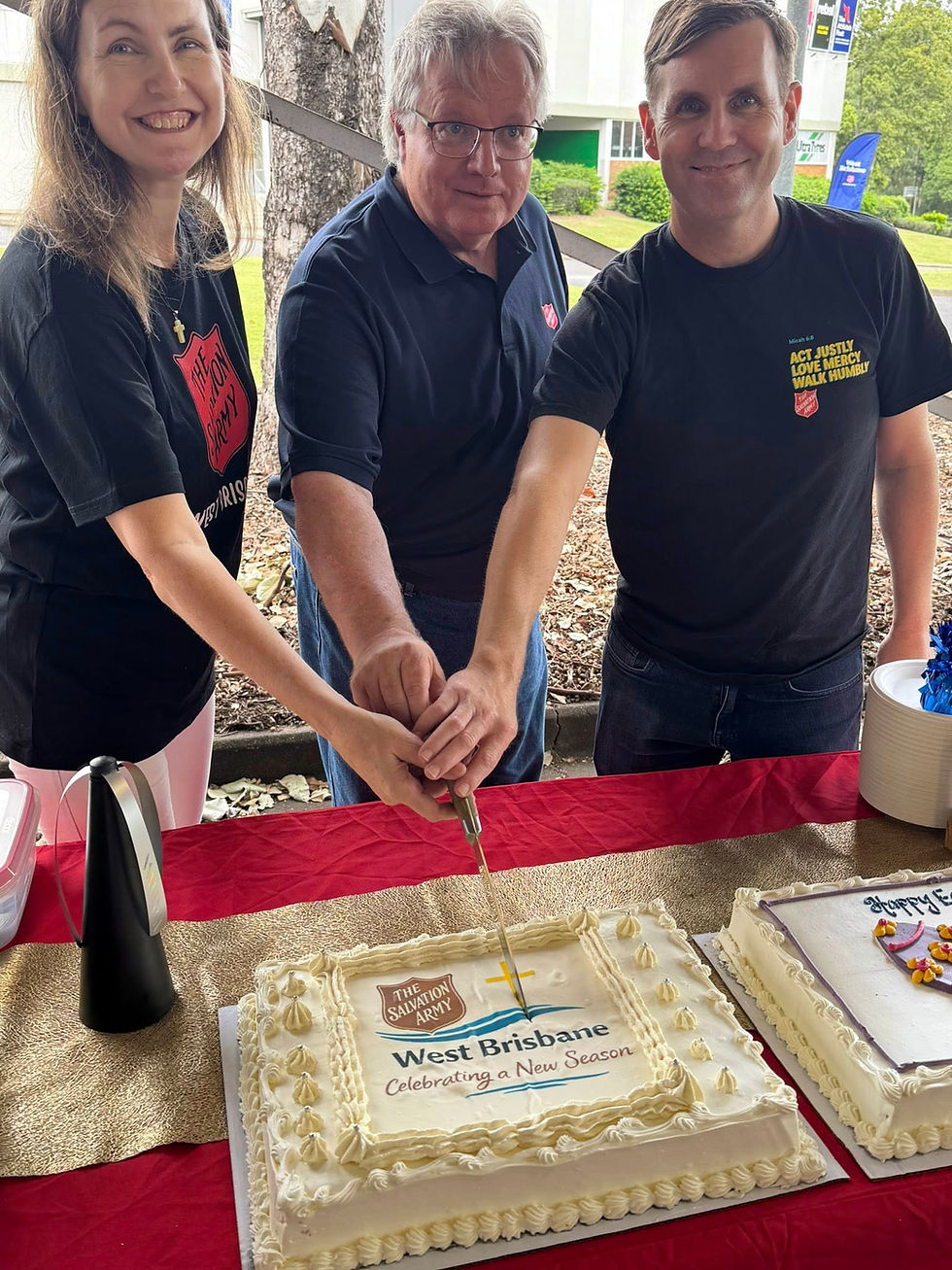The official cake-cutting ceremony – Catherine, Stephen and Brad do the honours.