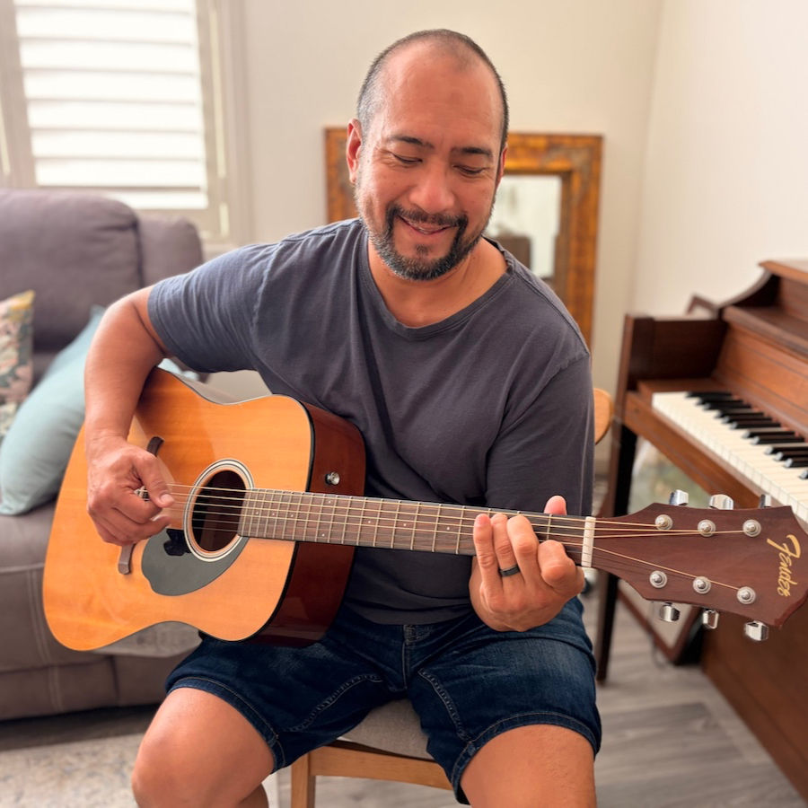 When not busy with his studies, Mike loves to pick up his guitar and belt out some favourite tunes.