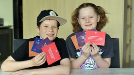 Families connecting with rally cry through mealtime conversation cards