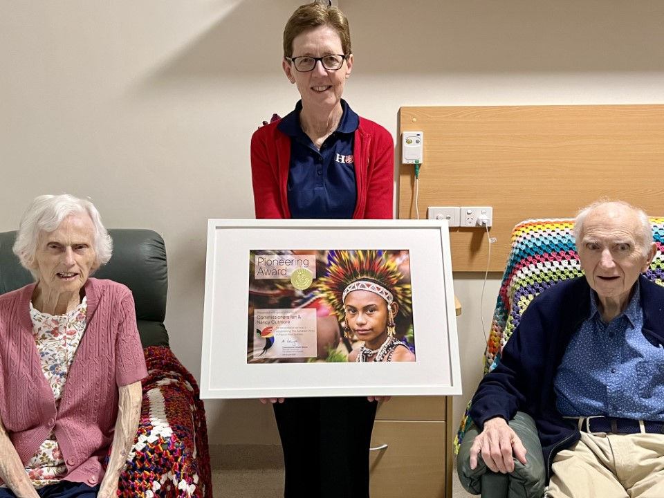 Territorial Commander Commissioner Miriam Gluyas presents Commissioners Ian and Nancy Cutmore with the first of the pioneering awards that are named after them.