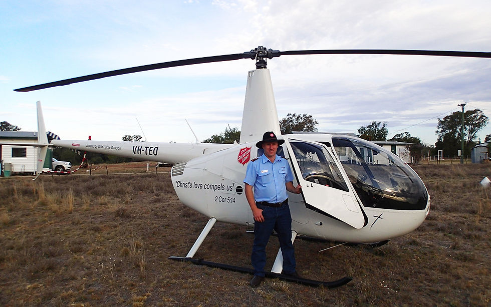 Mark and the helicopter he started with as a flying chaplain.