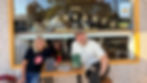 Salvos Mission Leader Lauren Martin and Baptist Church Minister Brad Blacker outside the Cupbearer Café in Helensburgh.