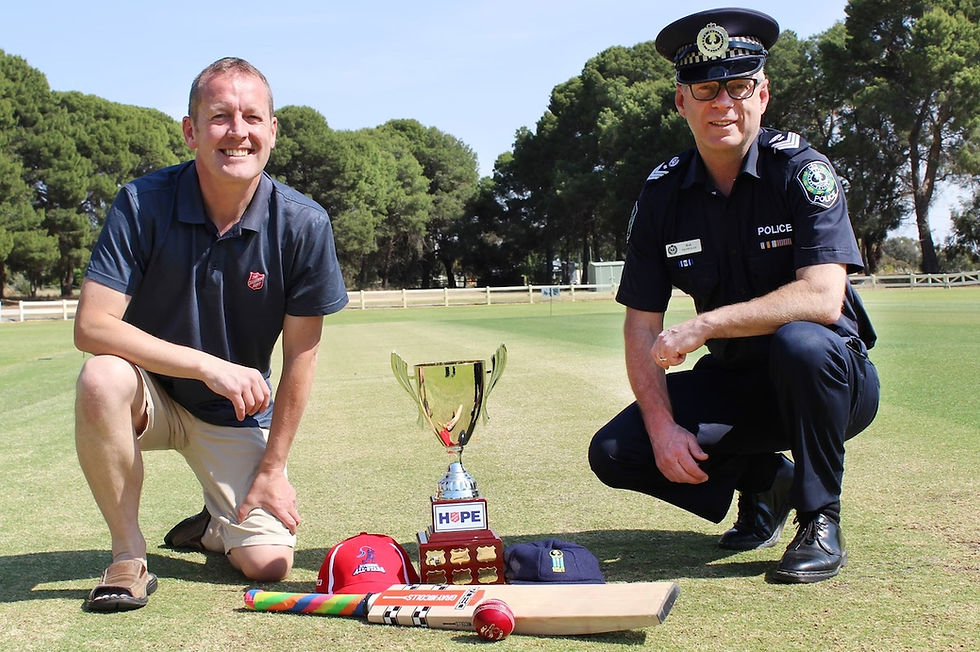 Riverside Gawler Salvos Corps Officer Major Darren Dwyer and Senior Sgt. Rob Mowday from Gawler Police ready to do battle on the cricket field. Image: supplied