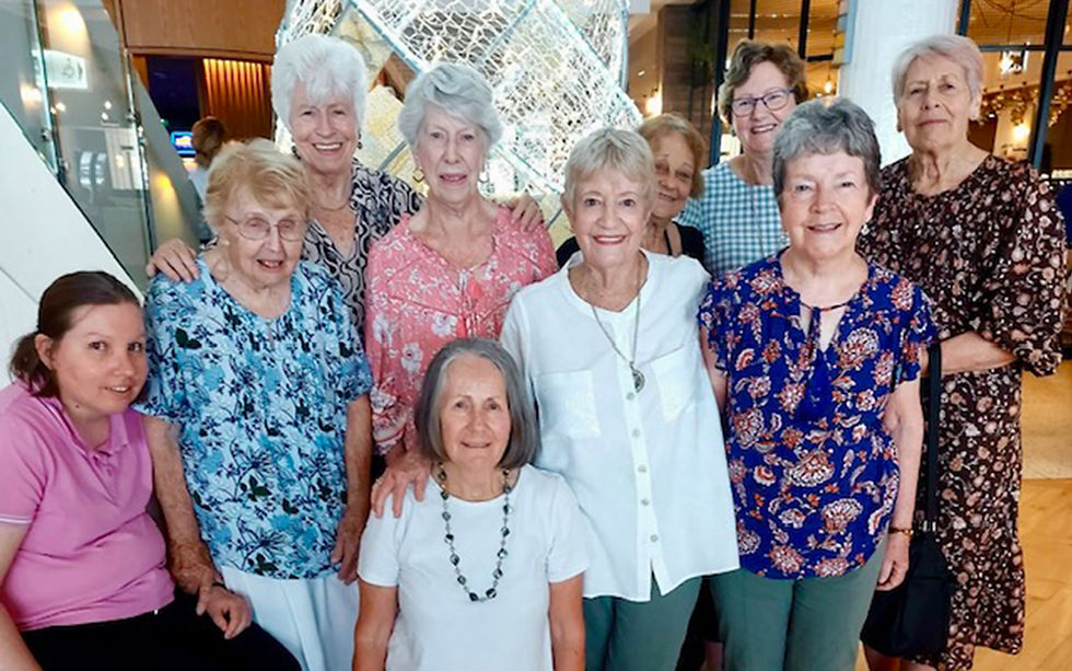 Maureen Abdilla (standing with white shirt) and the Merry Widows of Eastlakes Corps who meet regularly to support and encourage each other.
