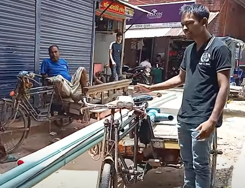 Lotus Ministry Voluneer Helping Install A Pump For Fresh Water