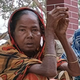 Rice Aid Recipient In Rural Bangladesh